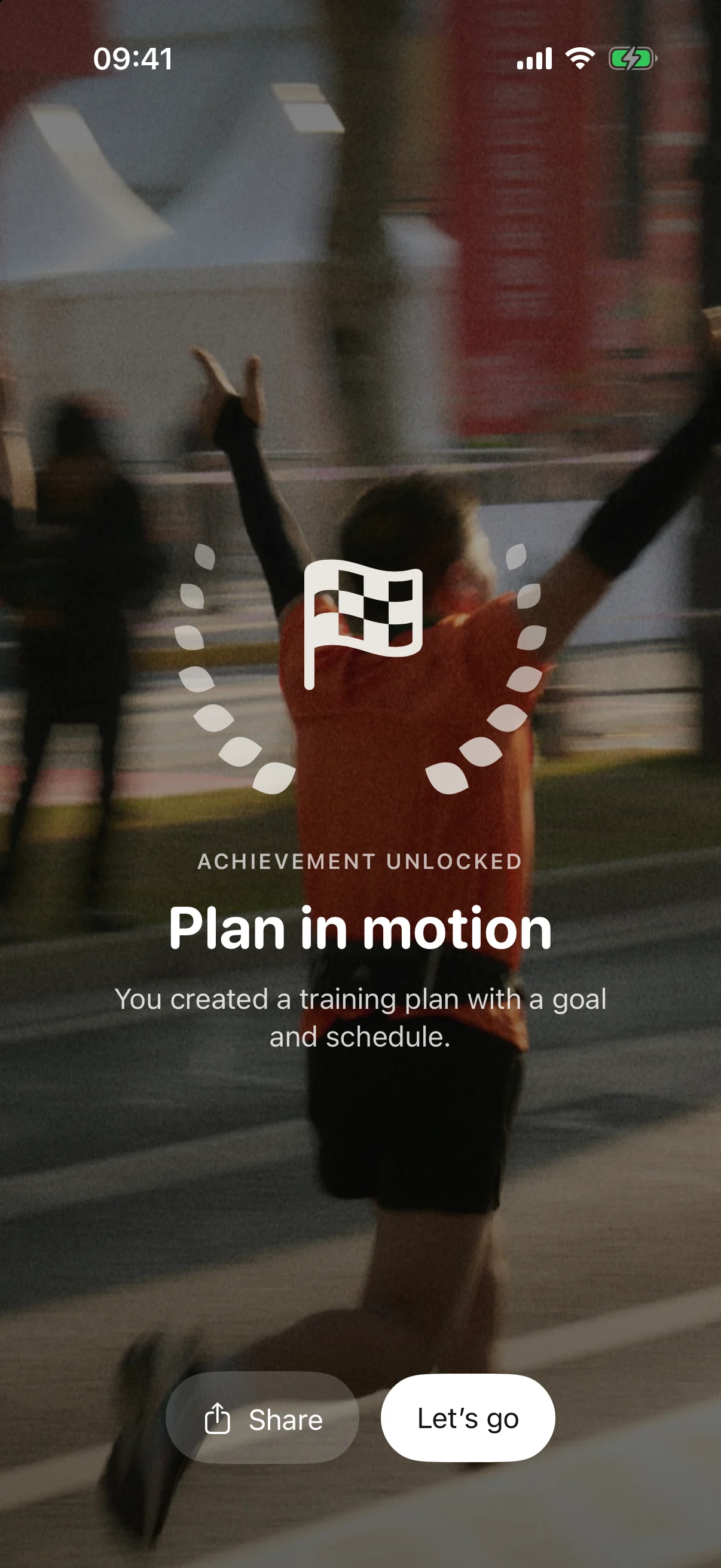 Exerzio Run celebration screen announcing the Plan in motion achievement